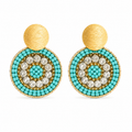 Turquoise and gold handmade beaded earrings crafted by Colombian artisans