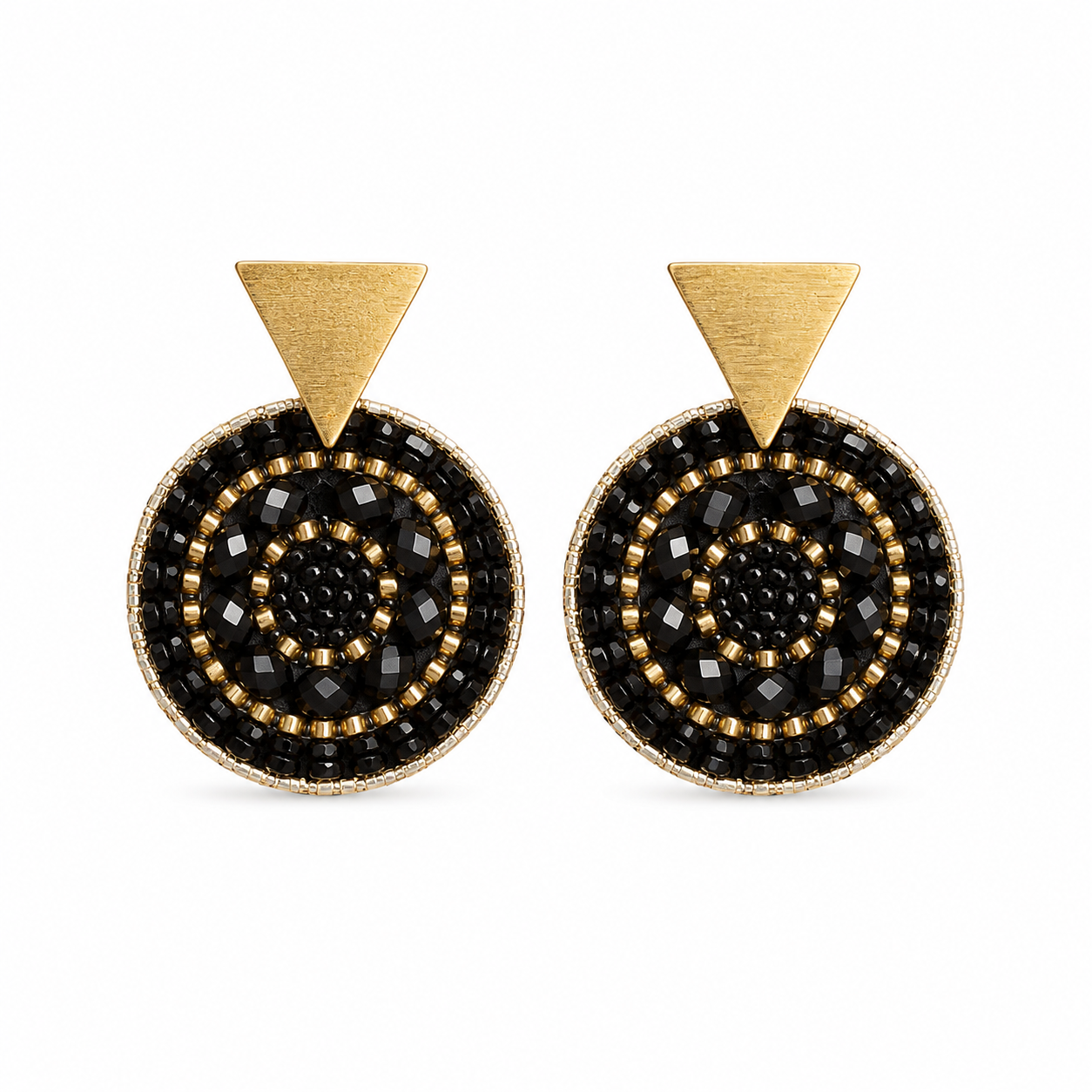 Black and gold handmade beaded earrings crafted by Colombian artisans